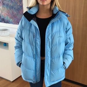 Blue Oakley puffy jacket.